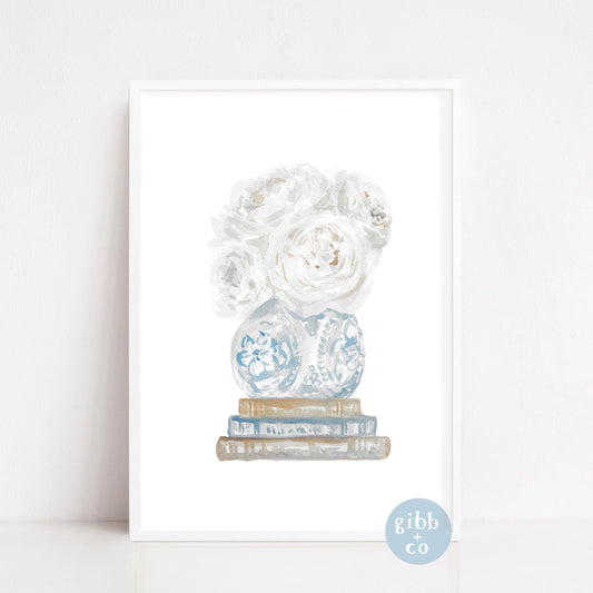 White peonies in blue vase with stacked books, book art print, floral art print